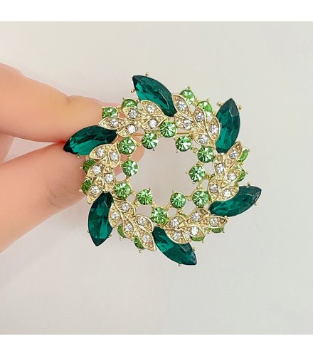 XSB307 - Elegant Round Green Diamond Brooch